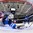 GRAND FORKS, NORTH DAKOTA - APRIL 21: Finland's Ukko-Pekka Luukkonen #1 reaches back to make the save on this play against the Russian forward while Klim Kostin #24 and Eetu Tuulola #19 look on during quarterfinal round action at the 2016 IIHF Ice Hockey U18 World Championship. (Photo by Minas Panagiotakis/HHOF-IIHF Images)

